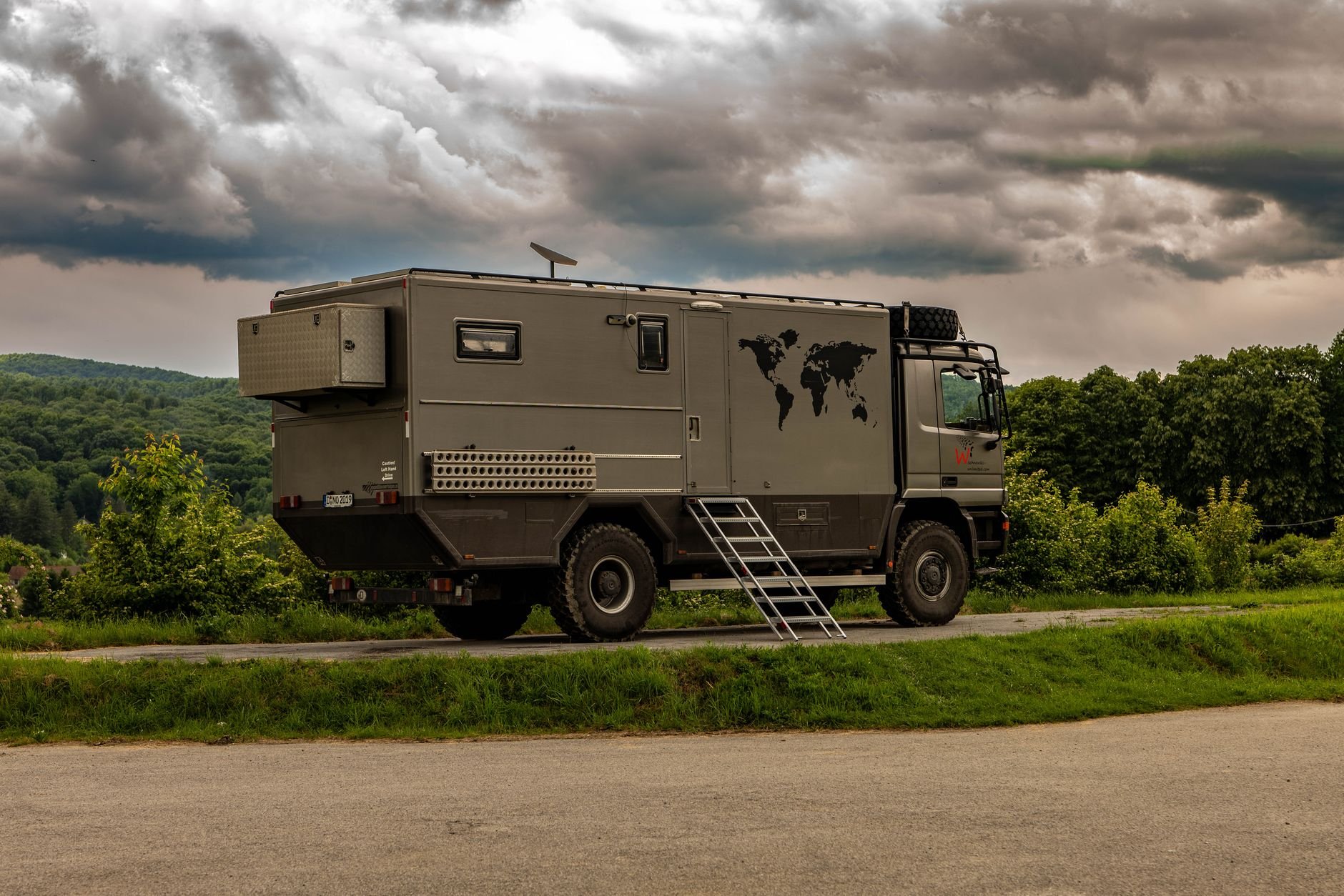Rugged expedition truck on open road